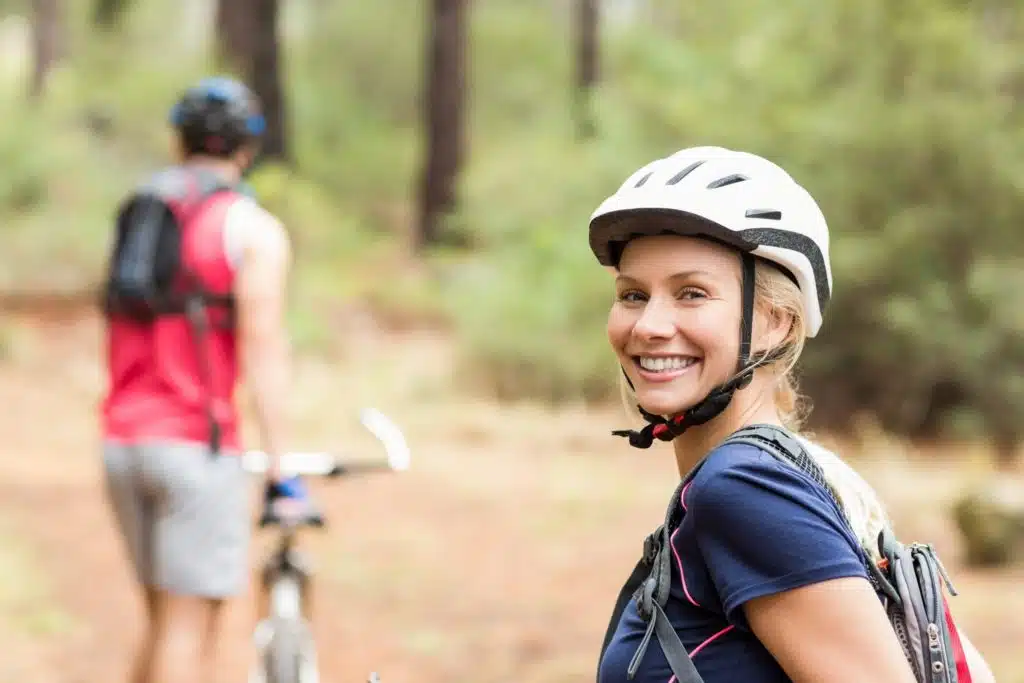 lady smiling on bike path