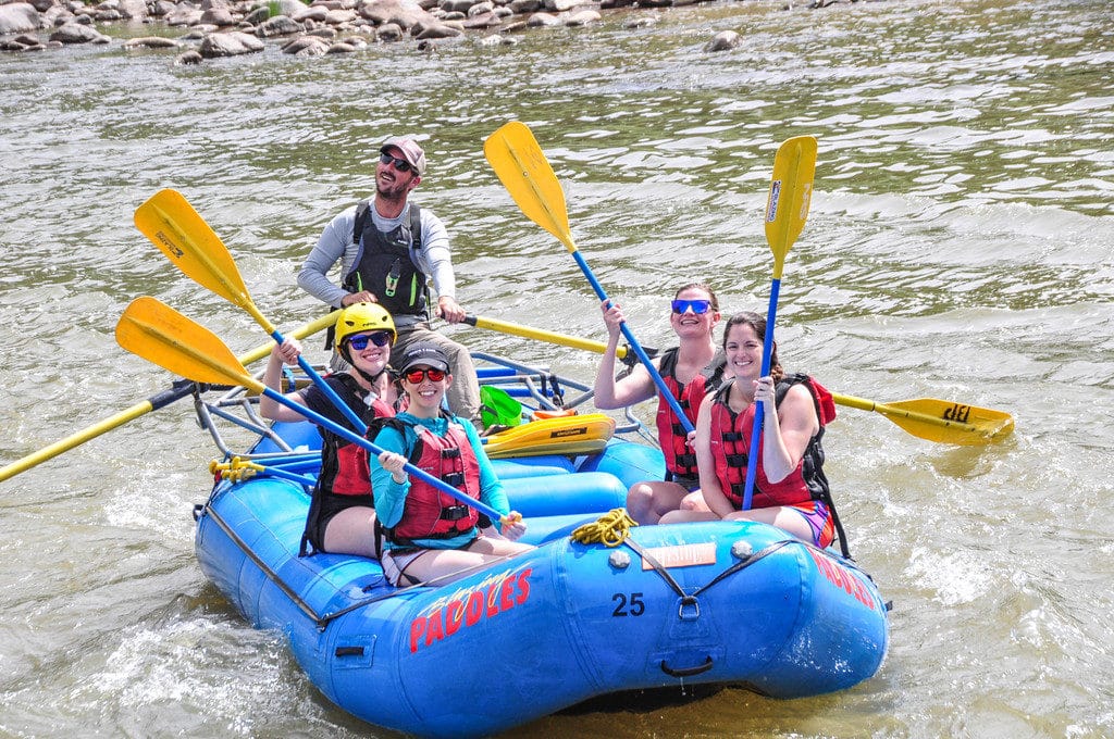 paddles up in the raft