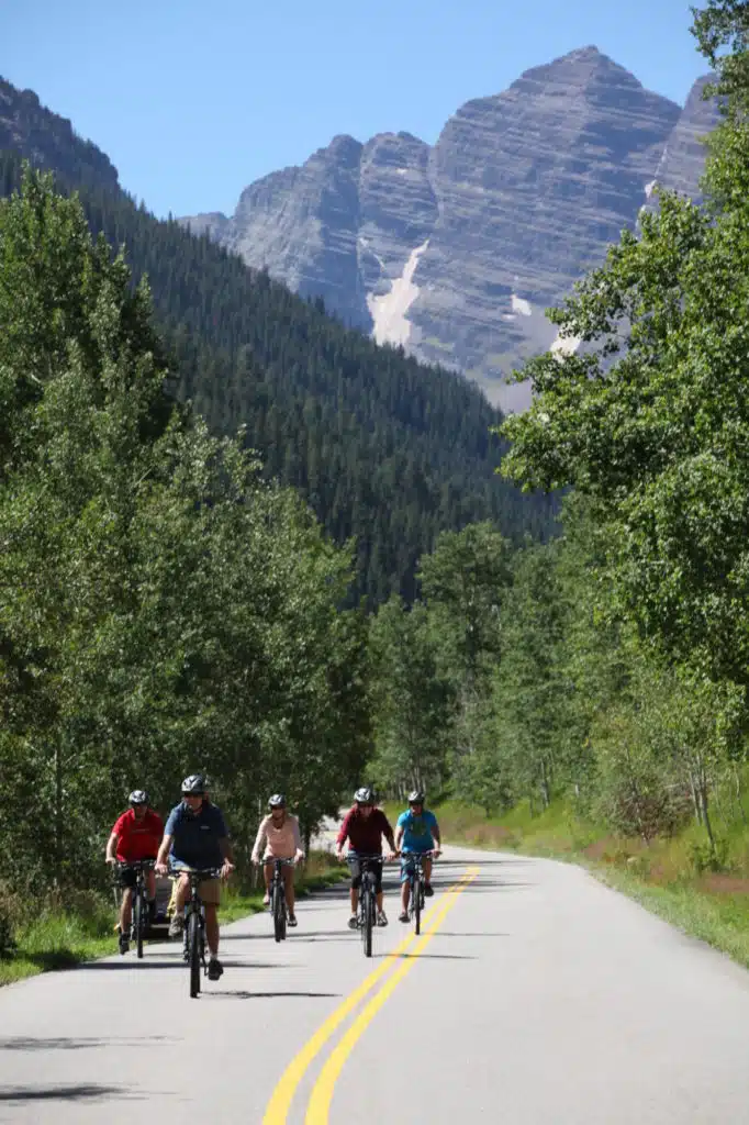 bikers with mountain background