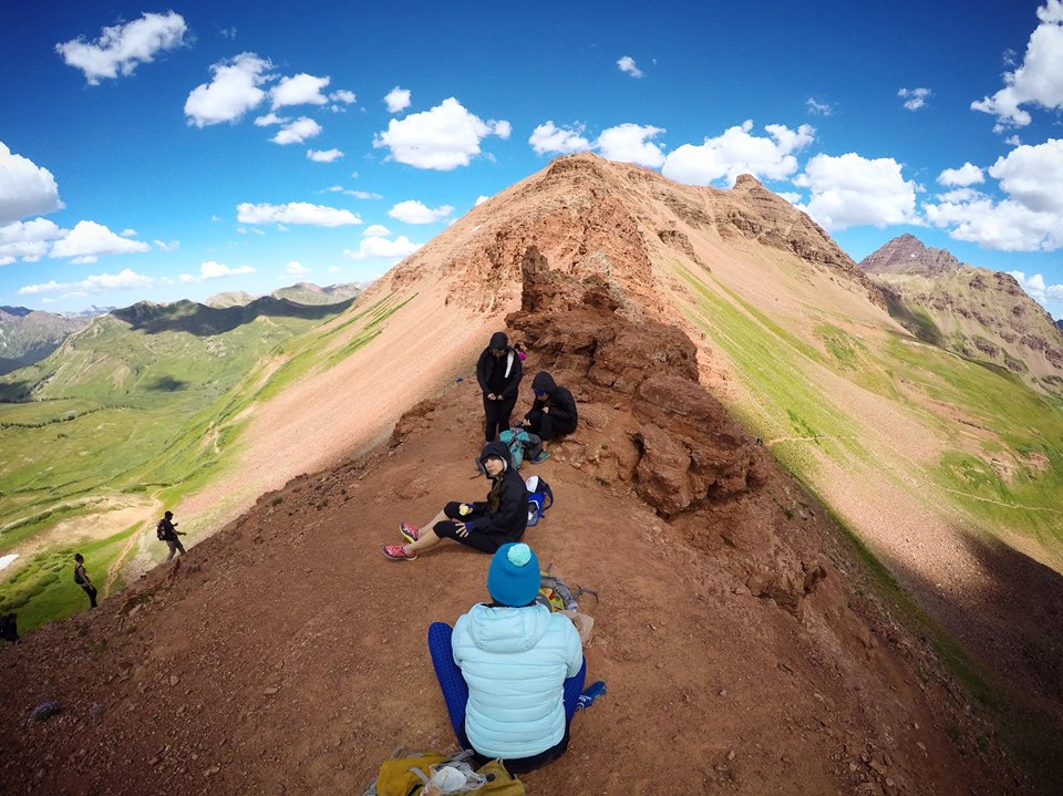 peoples resting on mountain