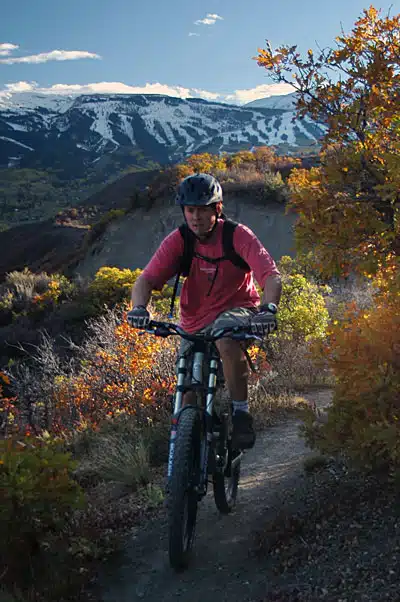 man biking on a path